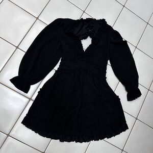 Black ruffle dress with back cut out